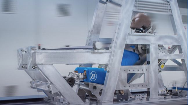 ZF Lifetec airbag testing machine with crash test dummy